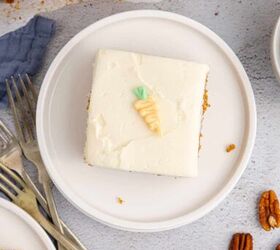 carrot sheet cake, Carrot Sheet Cake With Small Frosting Carrot Slice on a Plate