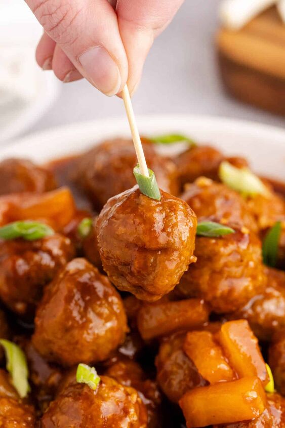 sweet and sour meatballs crockpot, Sweet and Sour Meatballs Crockpot Being Picked up on Toothpick