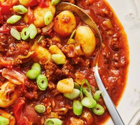 gnocchi bolognese recipe hearty and delicious gnocchi dish, Overhead image of Gnocchi Bolognese in a white bowl with a spoon