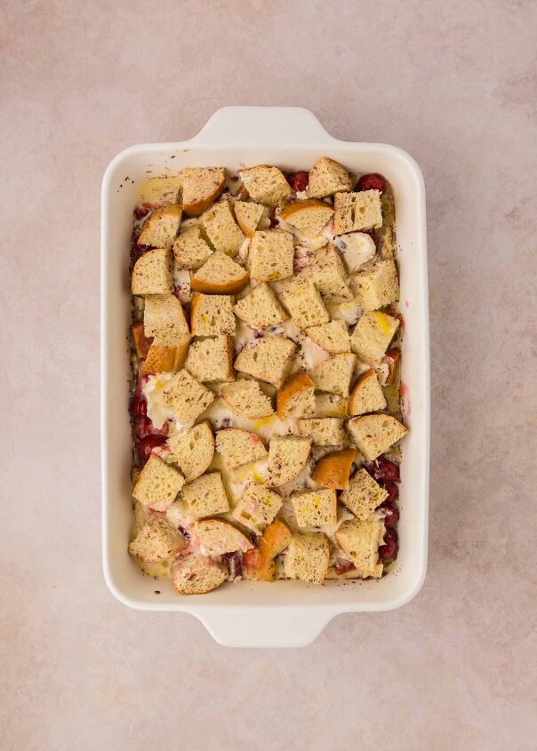 cherry cheesecake french toast casserole, egg mixture poured over top of casserole
