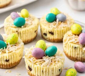 easter mini cheesecake cups, Mini cheesecakes on a decorative plate with candy coated eggs on top