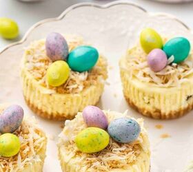 easter mini cheesecake cups, Mini Easter cheesecakes on a white plate decorated with bright Easter eggs and toasted coconut