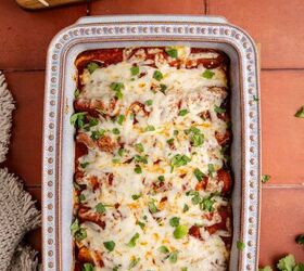 cheesy chicken enchiladas, Cheesy Chicken Enchiladas with cilantro in a Baking Dish