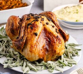 herb butter turkey and gravy, Herb Butter Turkey Cooked On a Platter with Fresh Sage