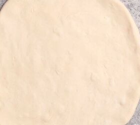 lamb sausage pizza with merguez, Pizza dough shaped ready for the toppings to be added