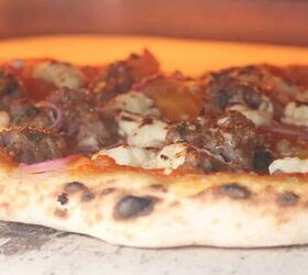 lamb sausage pizza with merguez, Pizza being baked in the Ooni pizza oven
