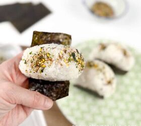 tuna onigiri recipe a quick and tasty japanese snack, Holding one tuna onigiri closer view