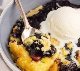 lemon blueberry dump cake, Lemon Blueberry Dump Cake in a Bowl with Ice Cream and a Spoon