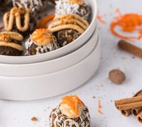 carrot cake biscoff energy balls, Carrot Cake Biscoff Energy Ball in front of plate of energy balls