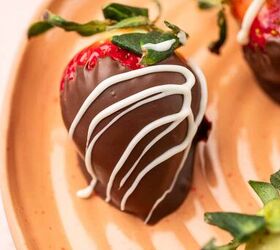 nutella covered strawberries, Single nutella covered Strawberry n a orange plate