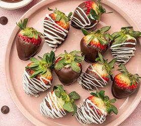 nutella covered strawberries, Strawberry covered chocolate and nutella dessert placed in a pink plate