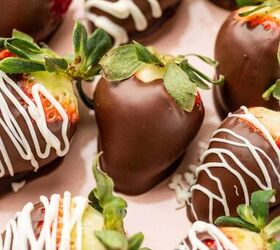 nutella covered strawberries, Close up shot of Nutella covered strawberries in a pink plate