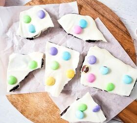 healthy homemade strawberry popsicles recipe, Pieces of Easter M M Oreo bark on a round wooden board