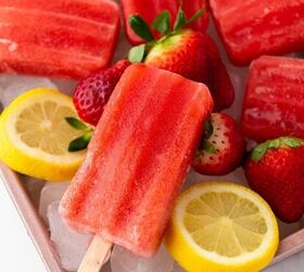 healthy homemade strawberry popsicles recipe, Strawberry popsicles with cut lemons on a tray
