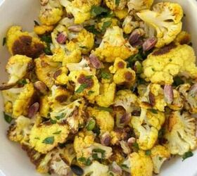 peanut butter stuffed dates, Roasted cauliflower in a white bowl with tahini sauce on the side