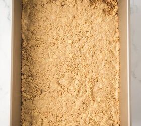 caramel cheesecake bars, Crushed graham crackers packed into a baking dish
