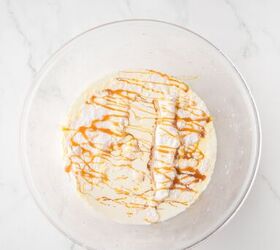 caramel cheesecake bars, Caramel cheesecake filling in a glass bowl before mixing