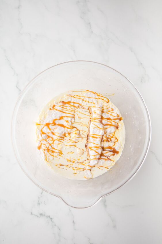 caramel cheesecake bars, Caramel cheesecake filling in a glass bowl before mixing