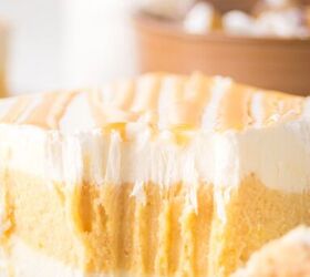 caramel cheesecake bars, A slice of caramel cheesecake bars with a piece bitten off
