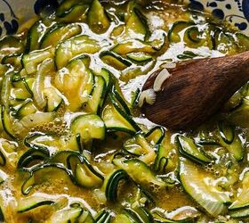spanish zucchini tortilla, Mixing the cooked zucchini and onions with the egg mixture in a mixing bowl