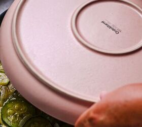 spanish zucchini tortilla, Placing a plate over the top of the tortilla to flip it
