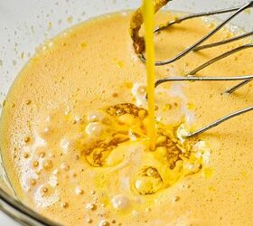lemon loaf cake, Melted butter being poured into the cake batter in a bowl
