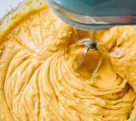 lemon loaf cake, Cake batter in a glass bowl being mixed with an electric hand mixer