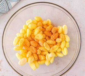 air fryer gnocchi, Overhead shot of showing how easy it is to season the recipe before you air fry it