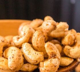 honey roasted pecans in air fryer, roasted cashews in a spoon