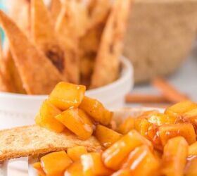 air fryer cinnamon tortilla chips and apple pie dip, Apple dip on a tortilla chip with tortilla chips background and apples in basket