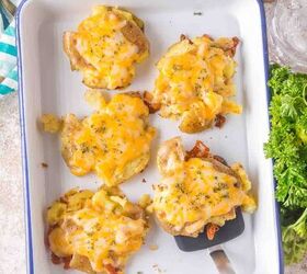 smashed potatoes with cheese, Five ooey gooey cheesy smashed potatoes with crispy bits of cheese on the sides waiting to be served