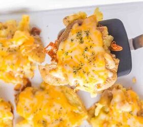 smashed potatoes with cheese, Serving smashed Baby Dutch Yellow potatoes from a tray The Colby Jack cheese is melted and crisped up on the sides