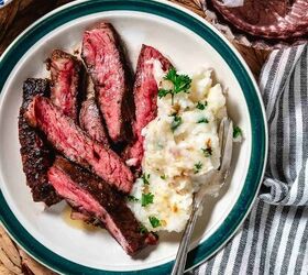 marinated chuck steak, sliced steak on a plate