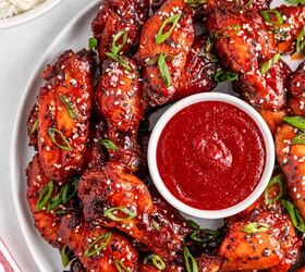 easy slow cooker korean chicken wings recipe, Delicious Korean chicken wings garnished with sesame seeds and green onions