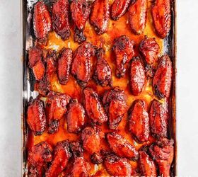 easy slow cooker korean chicken wings recipe, Broiled chicken wings arranged on a baking sheet