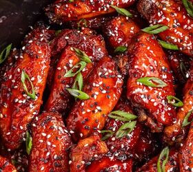 easy slow cooker korean chicken wings recipe, Appetizing Korean chicken wings featuring sesame seeds and green onions served in a slow cooker