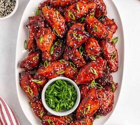 easy slow cooker korean chicken wings recipe, Flavorful Korean chicken wings sprinkled with mixed sesame seeds and green onions