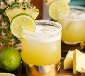 pineapple margarita, Pineapple Margarita with Pineapple and Lime Garnish on a Cutting Board