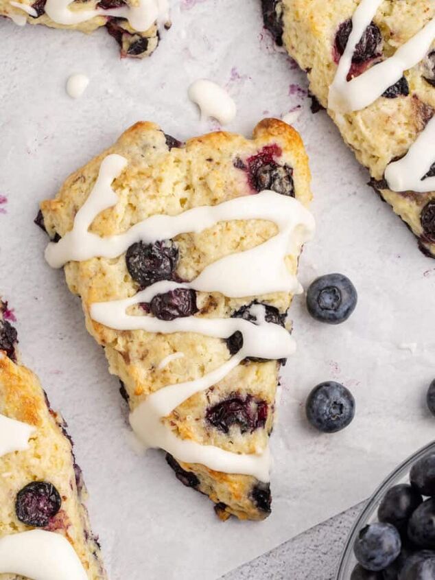 pineapple margarita, Lemon Blueberry Scones Recipe on parchment with blueberries beside