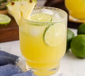 pineapple rum cocktail, Pineapple Rum Cocktail with a Pineapple and Lime garnish