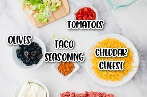 This ground beef taco dip is the ultimate appetizer for any gathering!