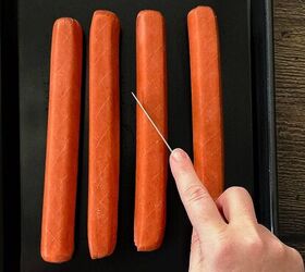 The delicious & smart reason you should cut an X into your hot dogs this week