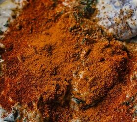 cajun crab spinach artichoke dip, Old bay seasoning and other spices added to the creamy spinach artichoke mixture