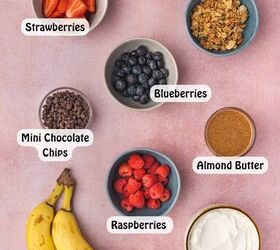 high protein banana split yogurt recipe for breakfast, The fresh ingredients for a yogurt banana split including strawberries blueberries and more healthy toppings