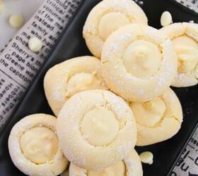 5 ingredient lemon white chocolate cookies with cake mix, A plate of lemon cookies displayed on a newspaper with lemons nearby