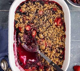 mixed berry crisp with frozen berries, Mixed Berry Crisp with Frozen Berries baked in a casserole dish with a serving spoon