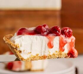cherry cheesecake pie, Cherry Cheesecake Pie on a pie server with sauce dripping down the side