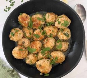 chicken piccata meatballs gf, Chicken Piccata Meatballs in a black pan with a spoon