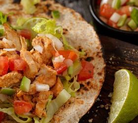 buffalo chicken tacos zesty chicken taco recipe, Overhead image of Buffalo Chicken Tacos with sides of pico de gallo and lime