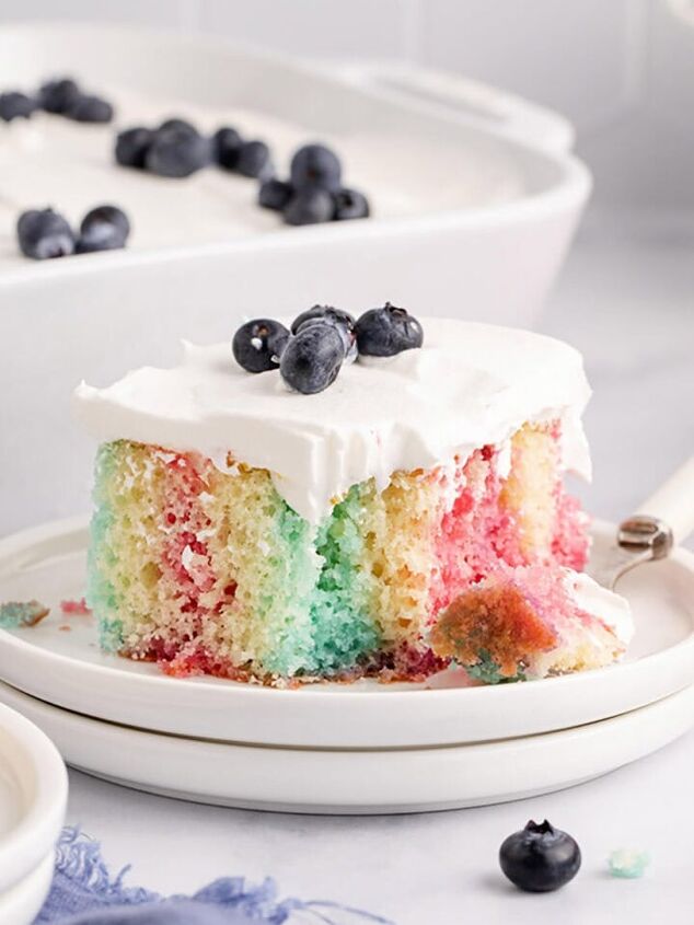 apple coffee cake recipe, Red White and Blue Poke Cake slice on a plate with a fork